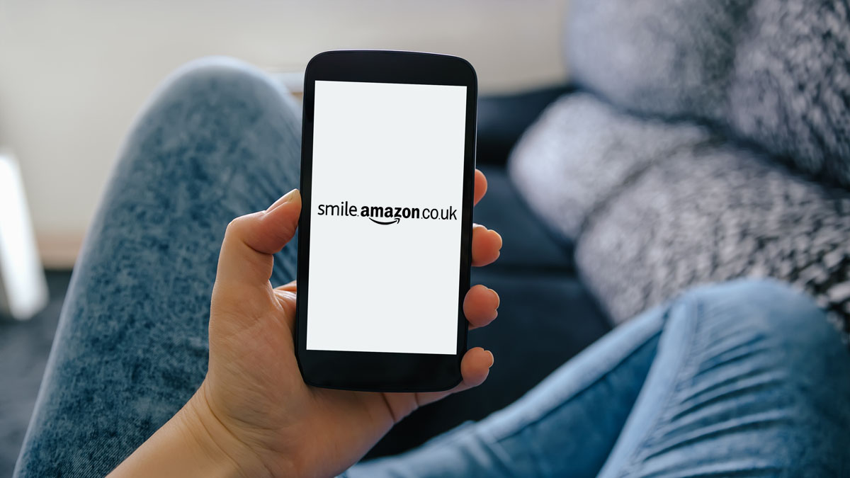 Amazon Smile logo on smart phone screen