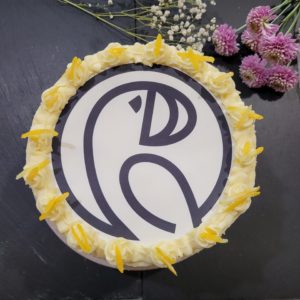 cake with charity logo on top
